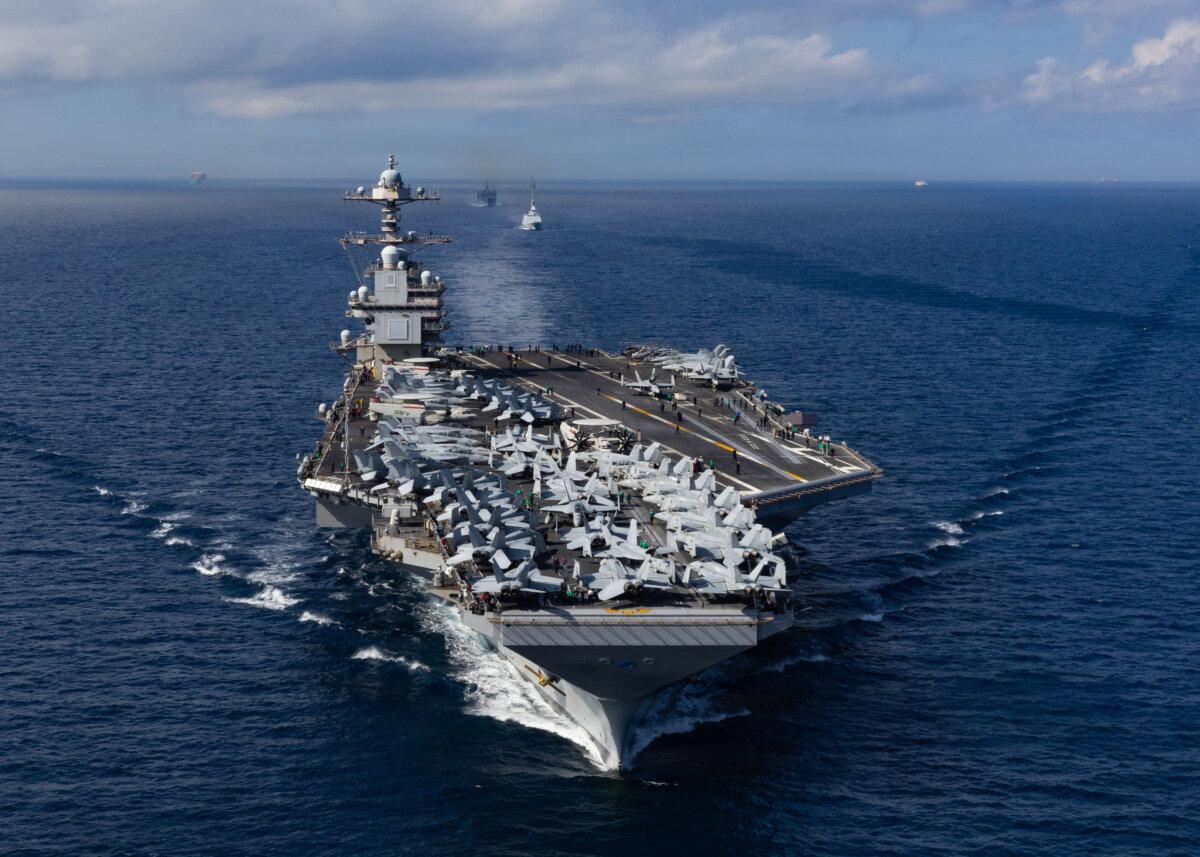 From front to back, the world’s largest aircraft carrier, USS Gerald R. Ford (CVN 78), Royal Moroccan Navy FREMM multipurpose frigate Mohammed VI (701), and Military Sealift Command fast combat support ship USNS Supply (T-AOE 6), steam in formation while transiting the Strait of Gibraltar, on Oct. 1, 2025. (U.S. Navy photo by Mass Communication Specialist Seaman Apprentice Alyssa Joy)