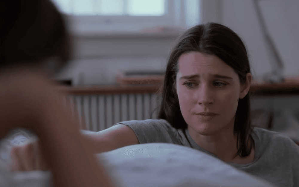 Nora (Renate Reinsve, L) and sister Agnes (Inga Ibsdotter Lilleaas) have a heart-to-heart talk, in "Sentimental Value." (Nordisk Film/Mubi)