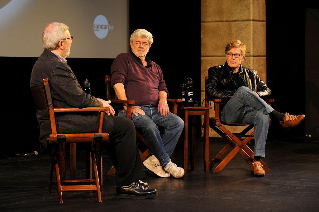 (L–R) Film Critic Leonard Maltin, director George Lucas, and Sundance Institute President Robert Redford speak during the 2015 Sundance Film Festival in 2015. (Clayton Chase/Getty Images for Sundance)