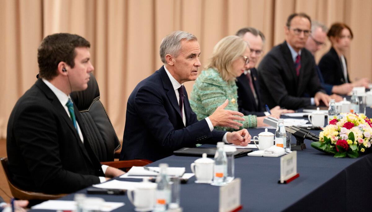 Prime Minister Mark Carney delivers opening remarks as he meets with Chinese leader Xi Jinping at the start of a meeting in Gyeongju, South Korea, on Oct. 31, 2025. (The Canadian Press/Adrian Wyld)