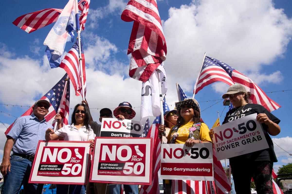 Opponents of California Proposition 50, also known as the Election Rigging Response Act, a California ballot measure that would redraw congressional maps to benefit Democrats, rally in Westminster, Calif., on Sept. 10, 2025. (AP Photo/Damian Dovarganes, File)