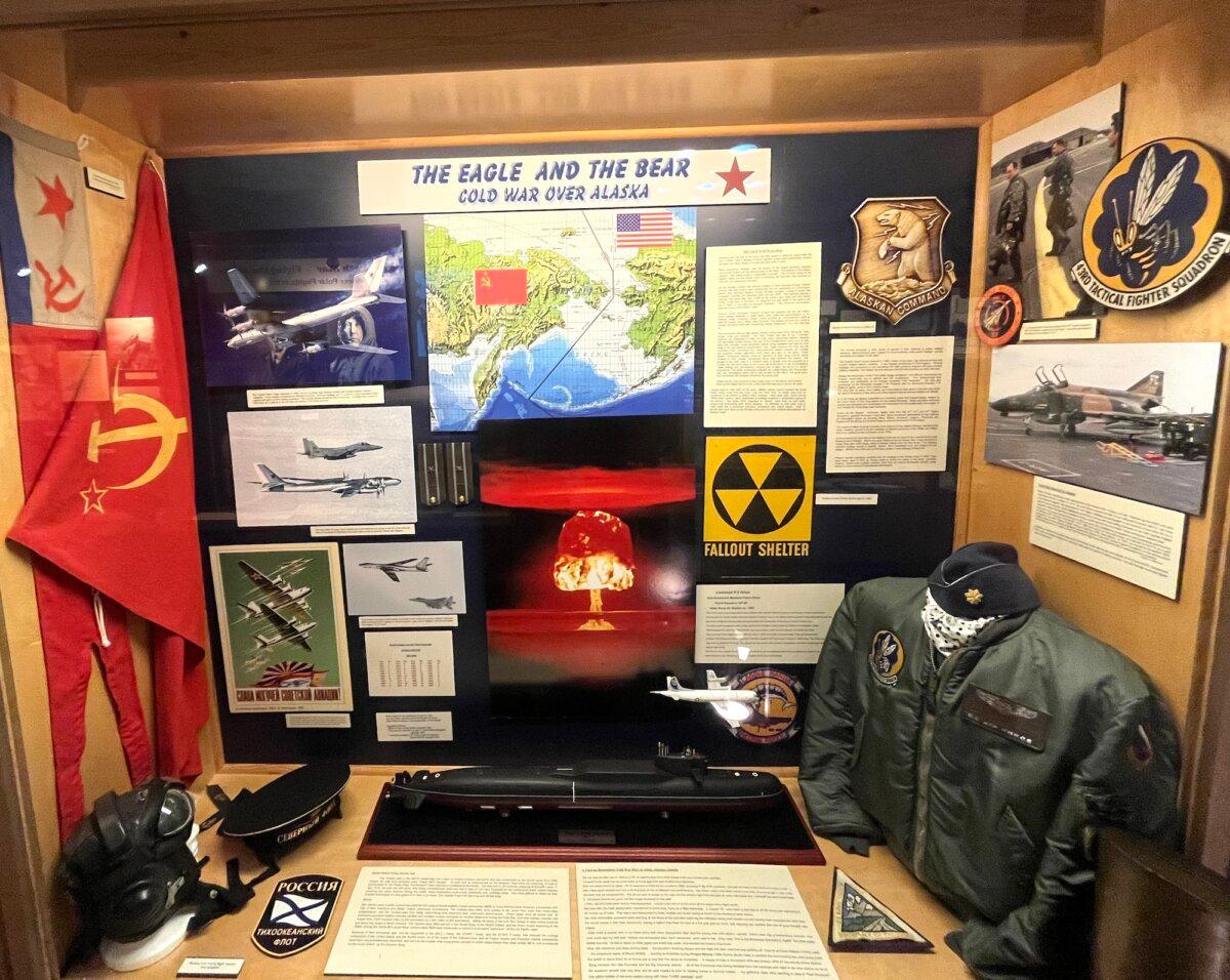 A historical museum display highlights important symbols and artifacts from the Cold War on Nov. 4, 2025. (Allan Stein/The Epoch Times)