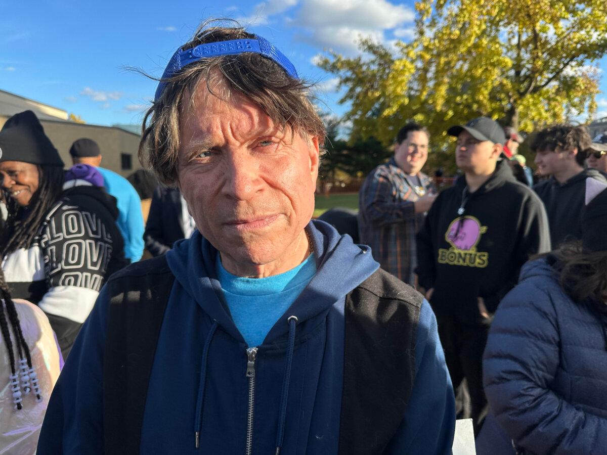 Johnn DeMarzio at the Mikie Sherrill campaign rally in Newark, N.J., on Nov. 1, 2025. (Juliette Fairley/The Epoch Times)