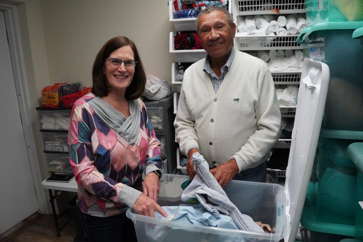 Co-chair Michele Duggan and Doug Pierce at the Marilyn Pierce GMIC Warming Station in Middletown, N.Y., on Nov. 1, 2025. (Oliver Mantyk/The Epoch Times)