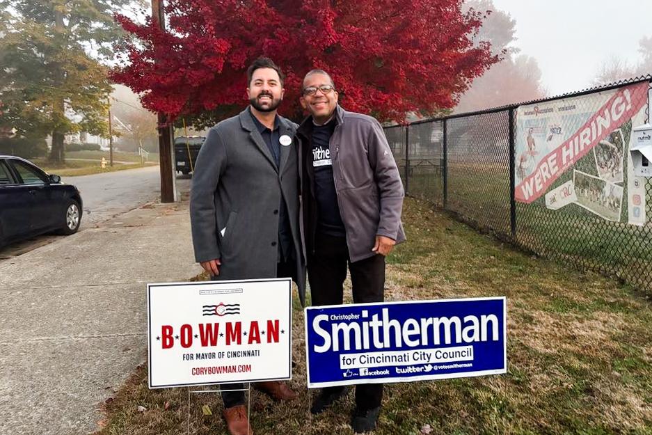 Cincinnati Republican mayoral candidate Cory Bowman (L) and independent city council candidate Christopher Smitherman (R) greet voters outside a poll at the Sayler Park Community Center in Cincinnati on Election Day morning in Cincinnati on Nov. 4, 2025. (Jeff Louderback/The Epoch Times)