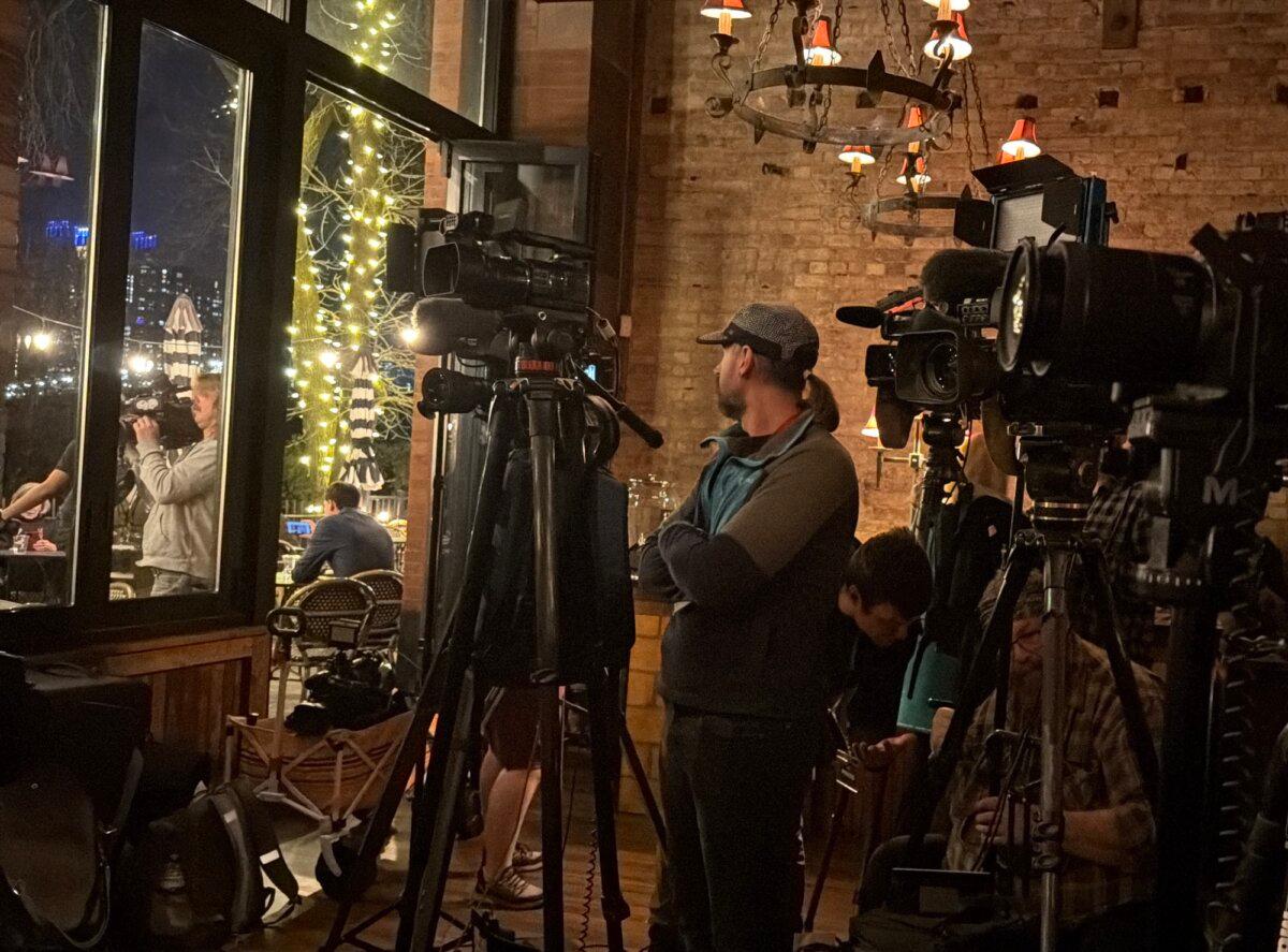 News crews await arrival of Minneapolis Mayor Jacob Frey, who was seeking a third mayoral term, at an election night party at Jefe Urban Cocina in Minneapolis on Nov. 4, 2025. (Janice Hisle/The Epoch Times)