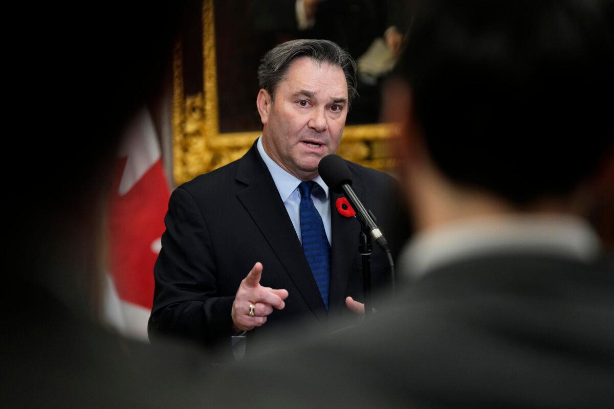 NDP Interim Leader Don Davies speaks in the Foyer of the House of Commons after the tabling of the federal budget on Parliament Hill in Ottawa on Tuesday, Nov. 4, 2025. (The Canadian Press/Justin Tang)