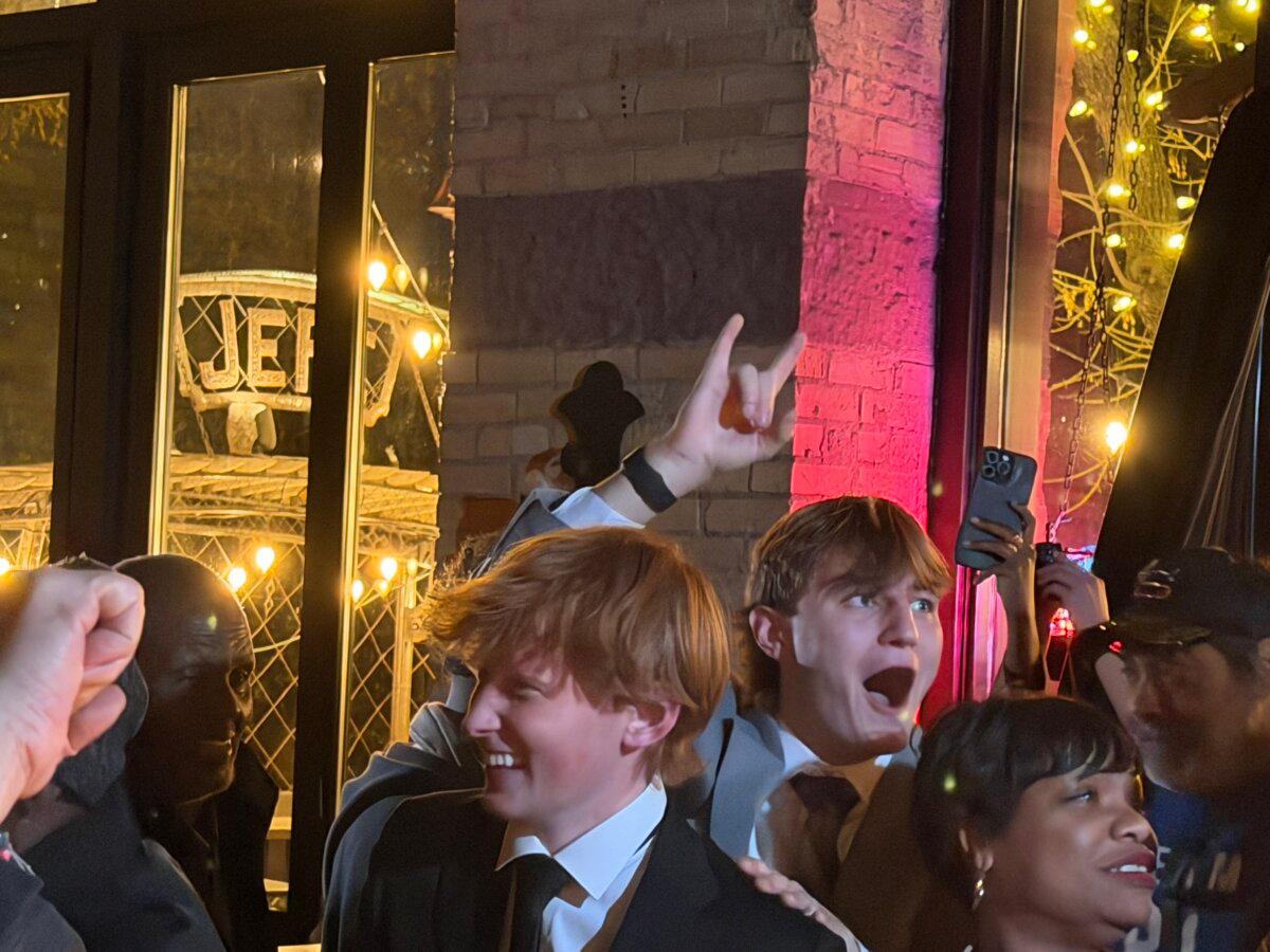Supporters of Minneapolis Mayor Jacob Frey react to reports that he had outpaced his nearest challenger by a 10 percent margin on election night in Minneapolis on Nov. 4, 2025. (Janice Hisle/The Epoch Times)