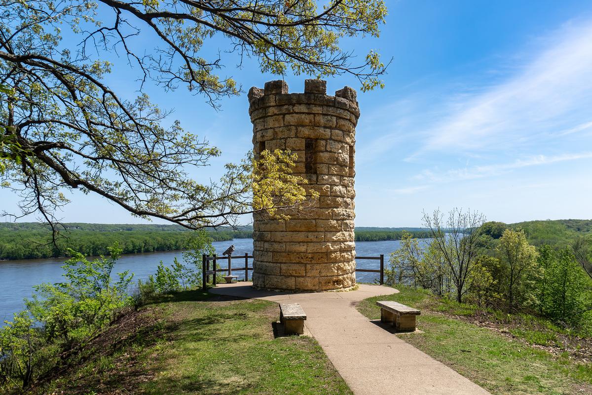 Julien Dubuque Monument sits atop a limestone bluff over the Mississippi River at the Mines of Spain in Dubuque, Iowa. (EWY Media/Shutterstock)