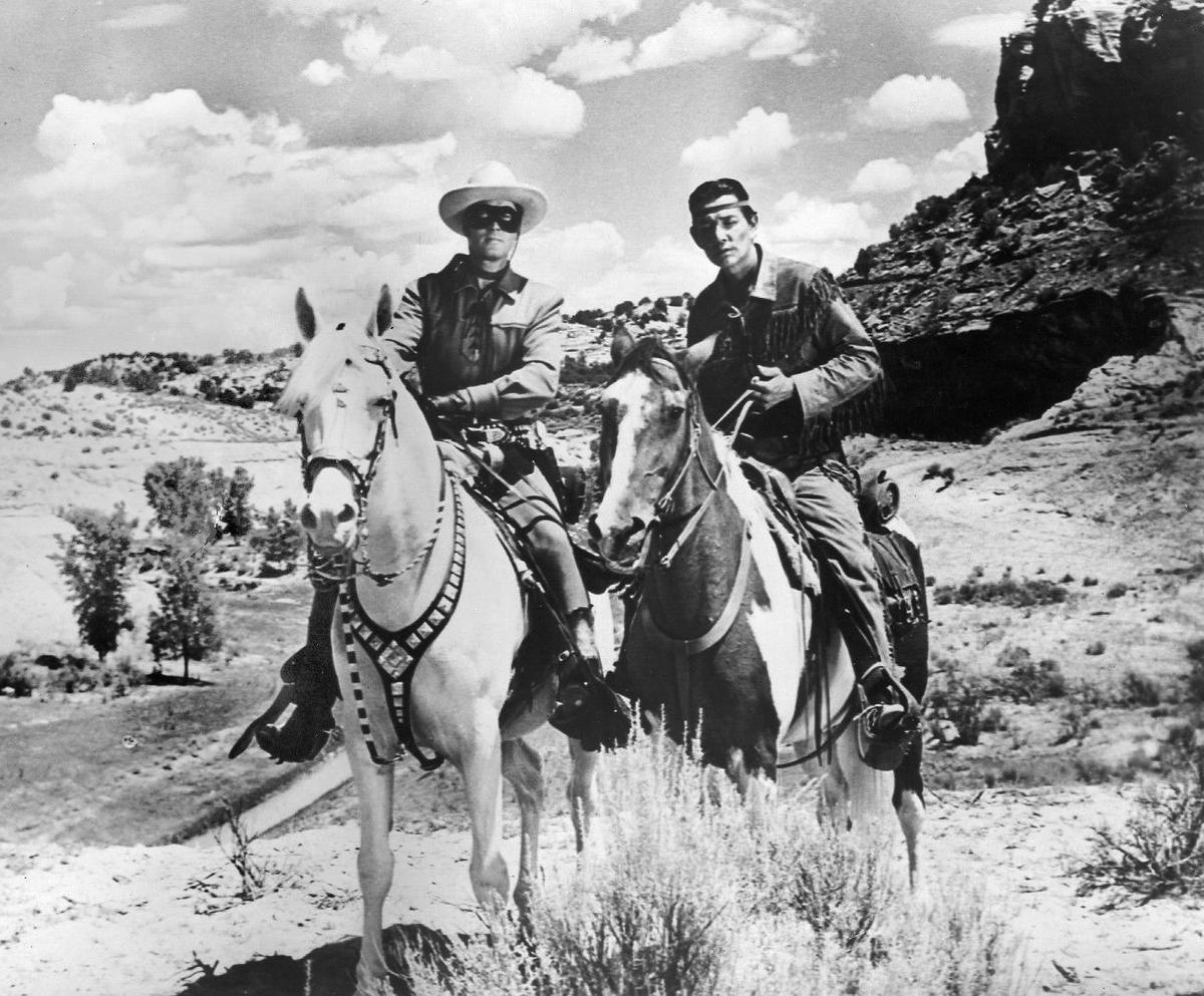 An ABC Television film still of Clayton Moore as the Lone Ranger and Jay Silverheels as Tonto in the famous show "The Lone Ranger," 1956. (Public Domain)