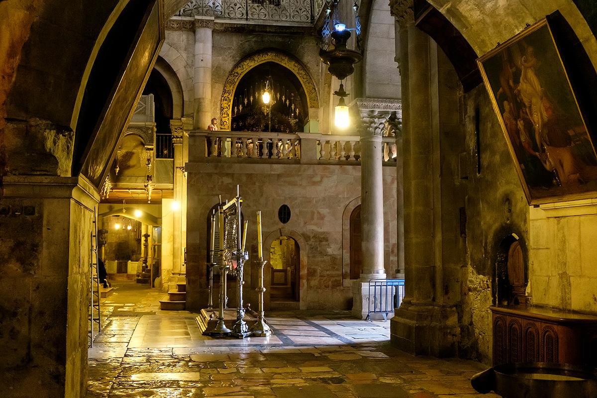The Stone of the Anointing is visible directly upon entering the church. Highly venerated by the Orthodox and adorned with standing candlesticks and a row of eight lamps, this reddish slab commemorates the anointing of the body of Jesus by Nicodemus and Joseph of Arimathea. The first recorded mention of it in the complex was by a pilgrim in 1288. (paparazzza/Shutterstock)