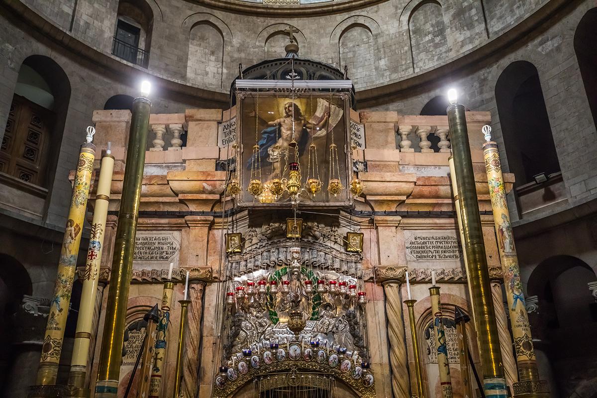 The Edicule (“little house”) encloses the Chapel of the Angel and Christ’s burial chamber. Destroyed and rebuilt four times, the current edifice with an onion-shaped cupola (above the painting of Christ) was constructed in the Ottoman baroque style by the Greek Orthodox community in 1810. It is shared by the orders, and in 2016, they finally agreed on an urgent restoration plan. (maziarz/Shutterstock)