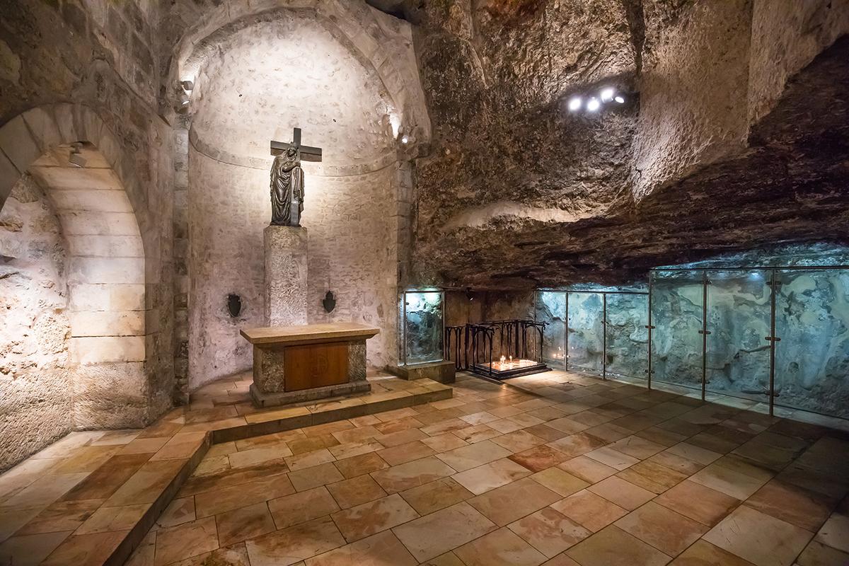 One descends a steep staircase of 22 steps from the Armenian Chapel of St. Helena to reach the Chapel of the Finding of the Cross. The lowest point of the entire church, the chapel is within an ancient limestone quarry that later became a cistern, or waterproof receptacle for water storage. According to tradition, this was where Empress Helena, mother of Constantine, discovered the True Cross. The space features faint traces of 12th-century frescos. (maziarz/Shuterstock)