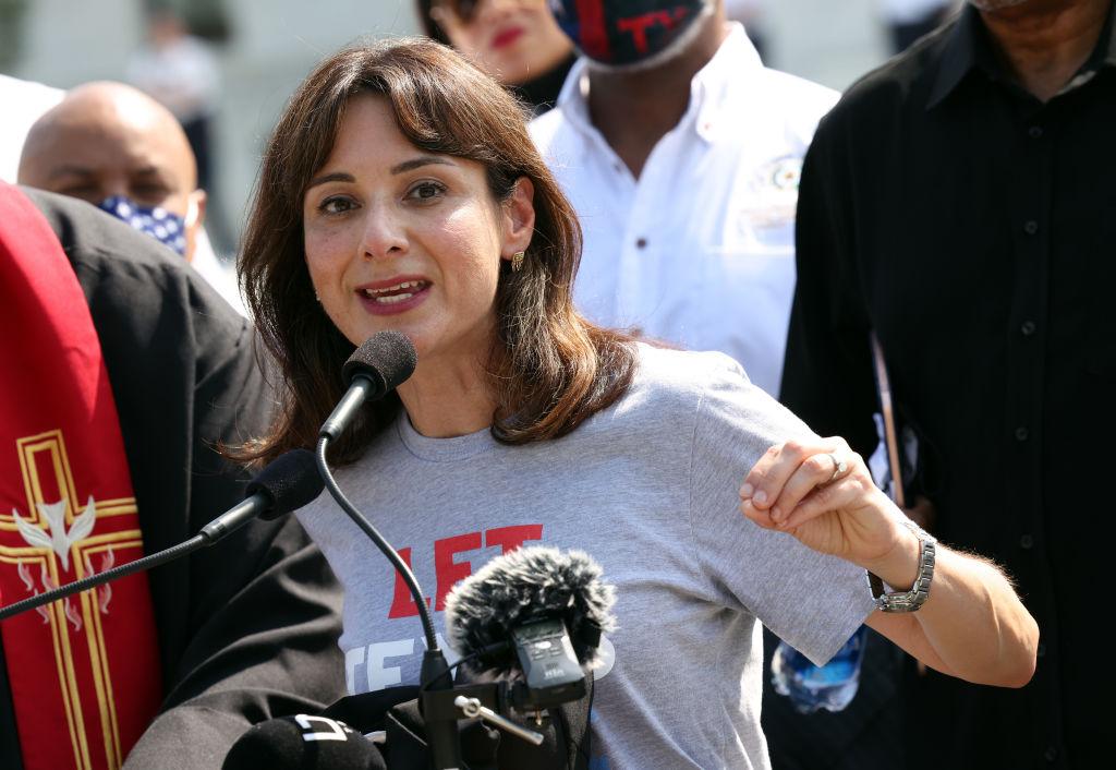 Texas State Representative Gina Hinojosa (D-District 49) speaks at the U.S. Supreme Court in Washington, DC, on Aug. 12, 2021. (Kevin Dietsch/Getty Images)
