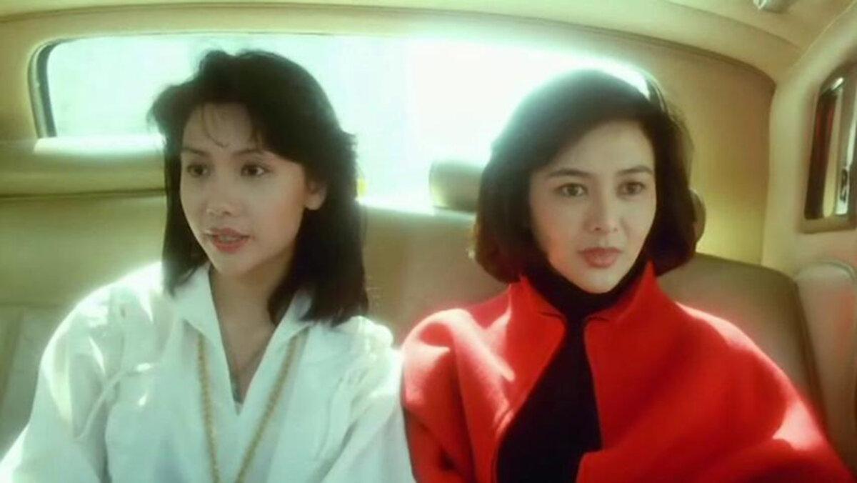 Banana Ho (Chingmy Yau, L) and Lucy Ching (Rosamund Kwan), in “Tricky Brains.” (GJW+)