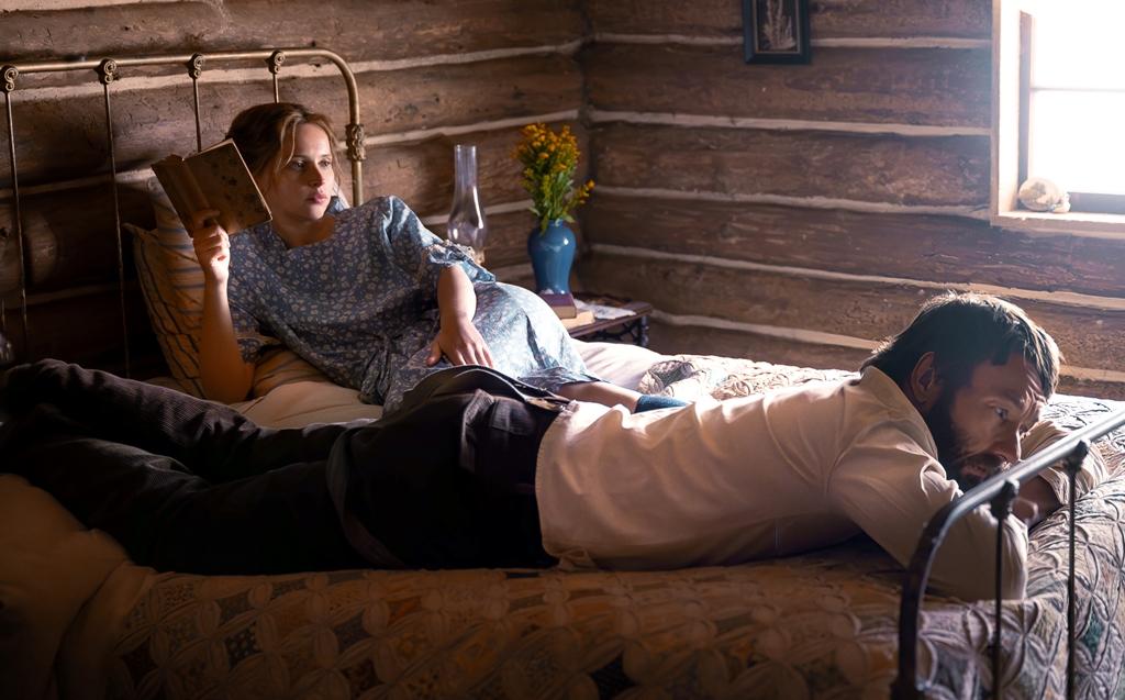 Gladys Grainier (Felicity Jones) and Robert Grainier (Joel Edgerton), in "Train Dreams." (Bit Bear Pictures)