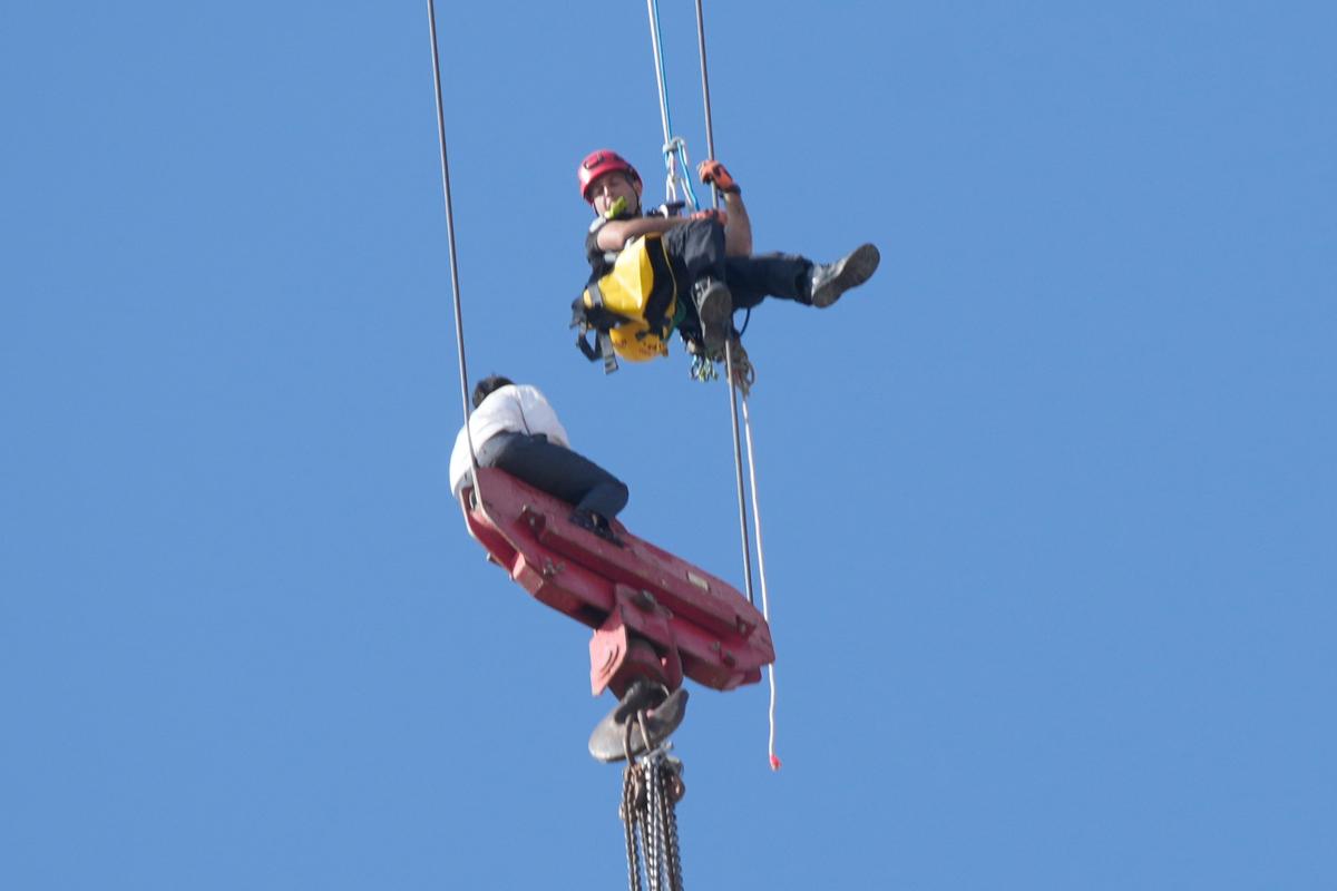 Fire Teams Rescue 15-Year-Old Stuck on Crane Over High-Rise Building in Jerusalem