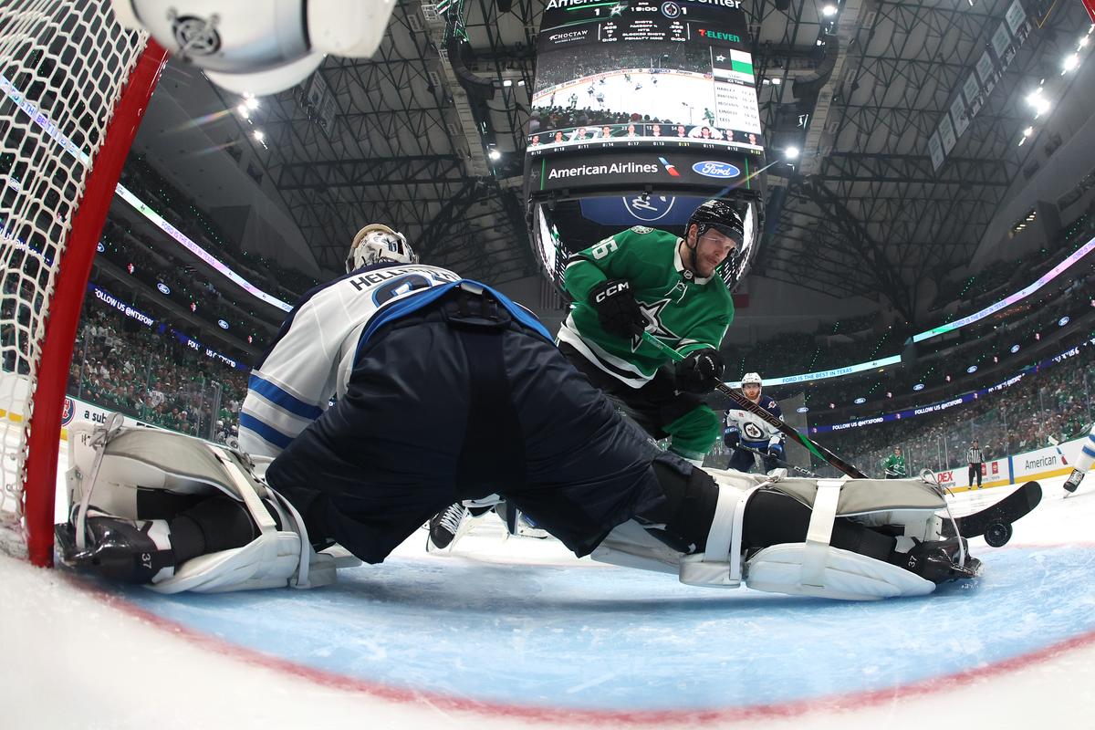 Mikko Rantanen #96 of the Dallas Stars takes a shot on Connor Hellebuyck #37 of the Winnipeg Jets during the third period in Game Six of the Second Round of the 2025 Stanley Cup Playoffs at American Airlines Center in Dallas, Texas on May 17, 2025. (Sam Hodde/Getty Images)