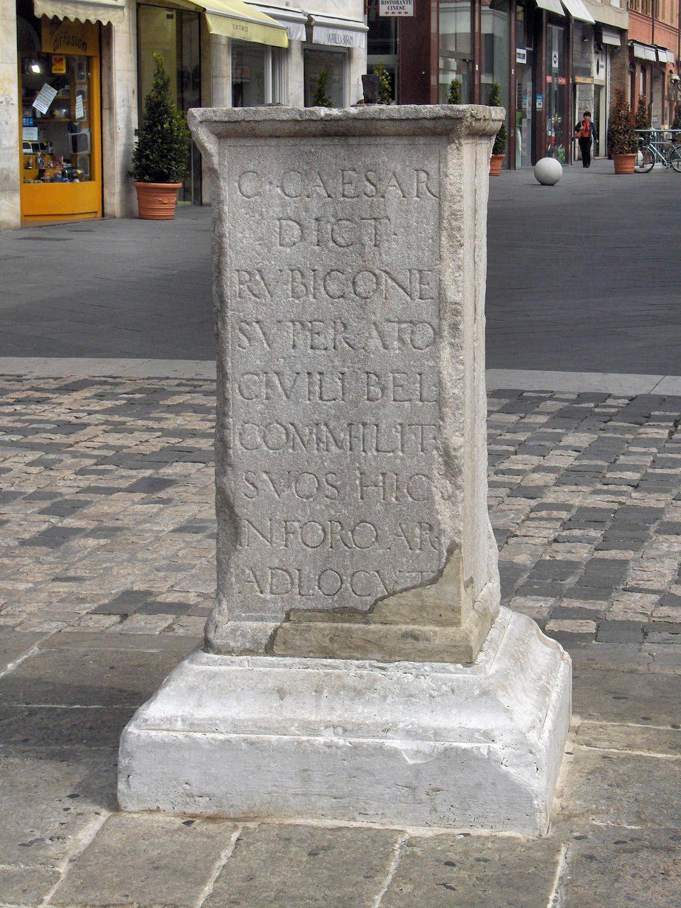 Renaissance inscription claiming to have been erected by Julius Caesar at the spot where he addressed his army after crossing the Rubicon. Rimini, Italy. (<a href="https://commons.wikimedia.org/wiki/User:JoJan">JoJan</a>/<a href="https://creativecommons.org/licenses/by-sa/4.0/">CC BY-SA 4.0</a>)