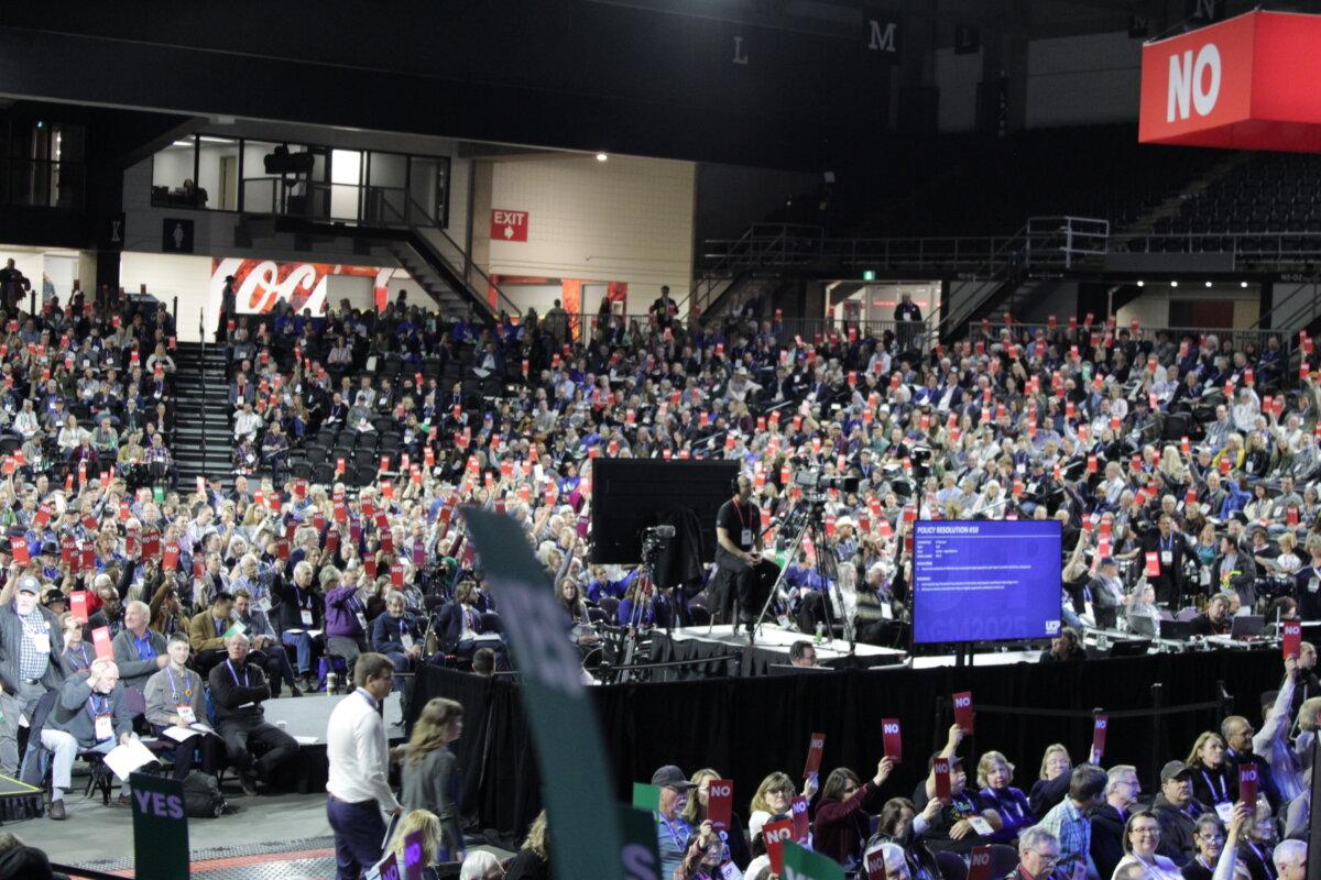 UCP members cast their votes during a policy debate at the United Conservative Party annual general meeting in Edmonton on Nov. 29, 2025. (The Epoch Times)