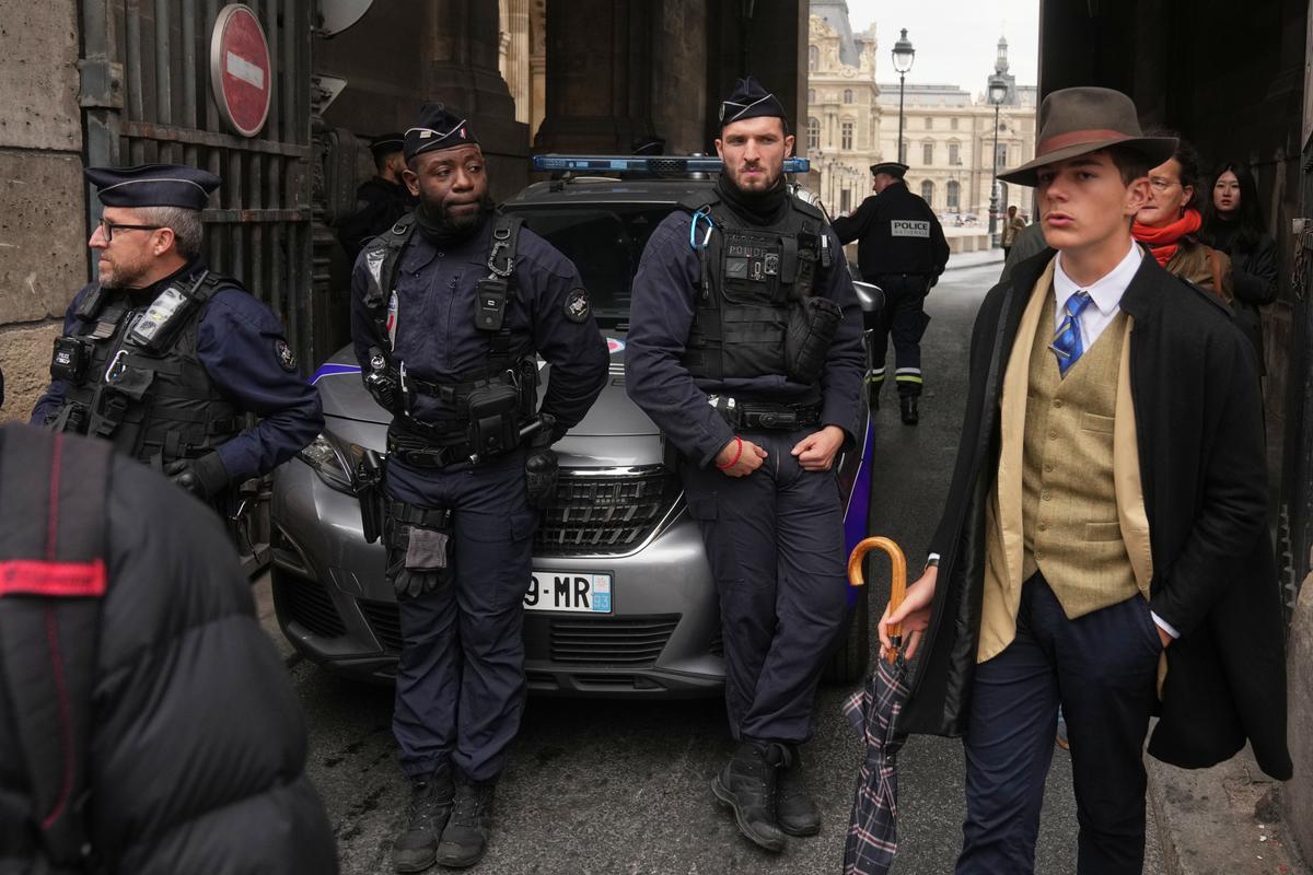 Fedora Man Unmasked: Meet the Teen Behind the Louvre Mystery Photo