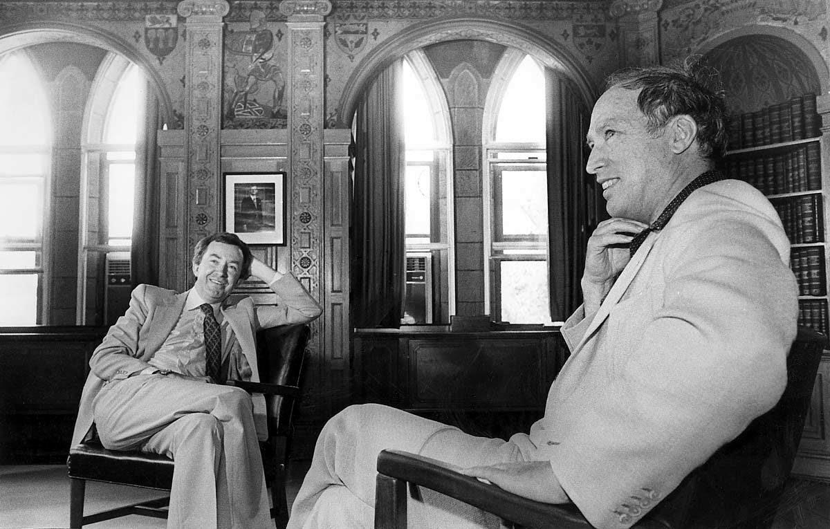 Prime Minister Joe Clark relaxes in his Parliament Hill office with former Prime Minister Pierre Trudeau on June 15, 1979. (CP Photo)