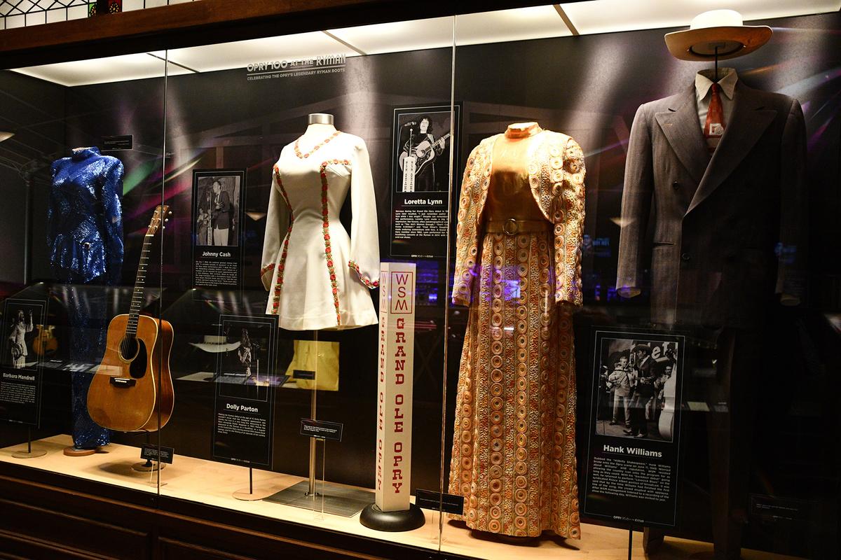 Exhibits in the Ryman Auditorium include stage costumes, original seating, Opry memorabilia, and interactive displays. (Ritu Manoj Jethani/Shutterstock)