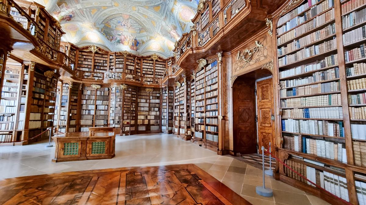 A library wing was added in 1744, a few decades after the establishment of the main monastery building. Designed by Johann Gotthard Hayberger (1695–1764), the library houses about 130,000 items. The reference library’s focal points are the ceiling frescoes and the stunning and shapely baroque-style wooden bookshelves that showcase marquetry, or pieces of wood arranged in a design. The library’s flooring features a highly polished and stenciled design that is offset by Solnhofen slabs, a type of limestone tile. (Ulrike Hiebl/Shutterstock)