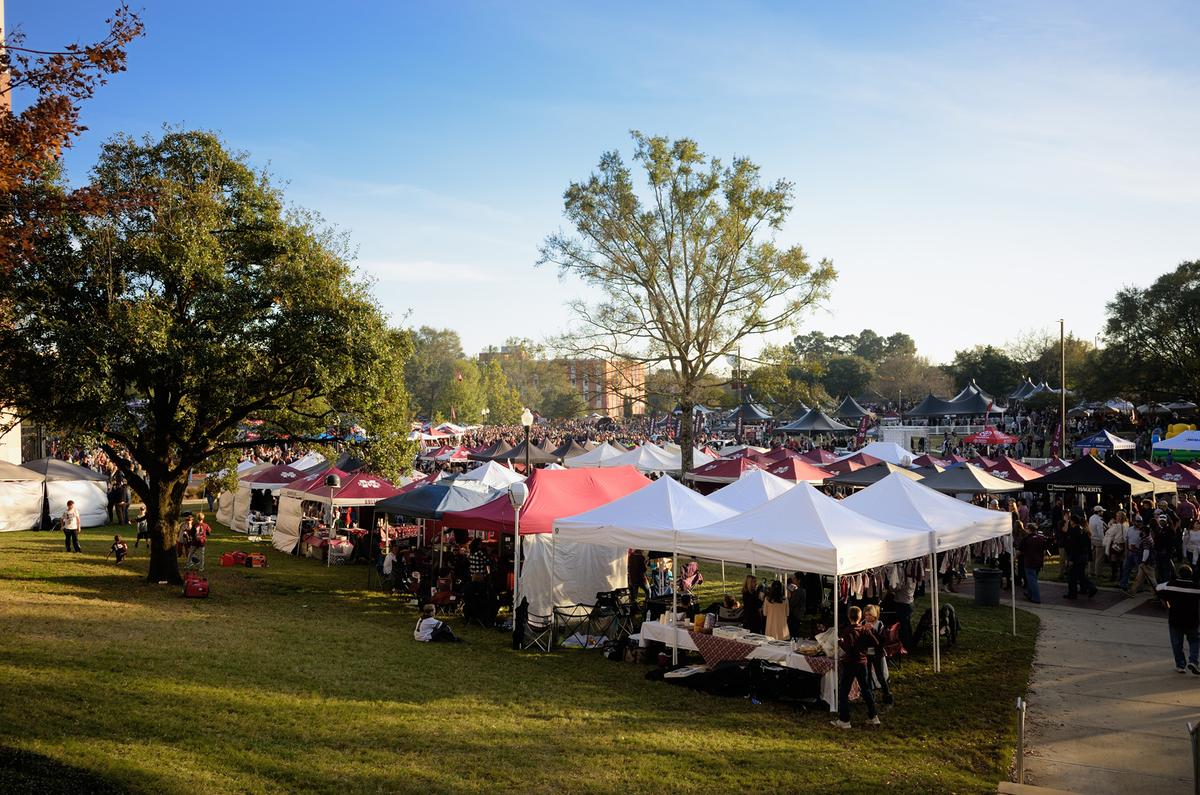 Tailgating has become a cherished American football tradition, in which fans gather before kickoff to share food, camaraderie, and school spirit. (sshepard/Getty Images)