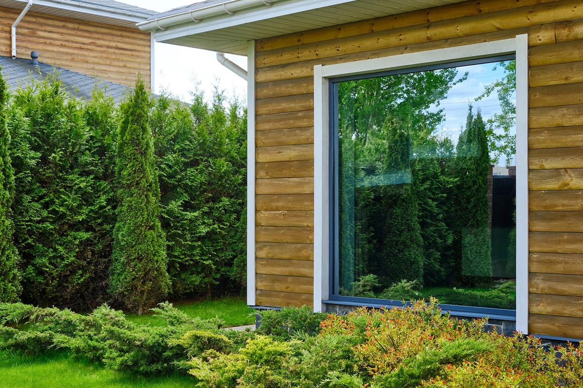 Windows are another weak point, as the radiated heat that passes through the panes can ignite combustible materials within the home. (Aleksandr Khmeliov/Shutterstock)