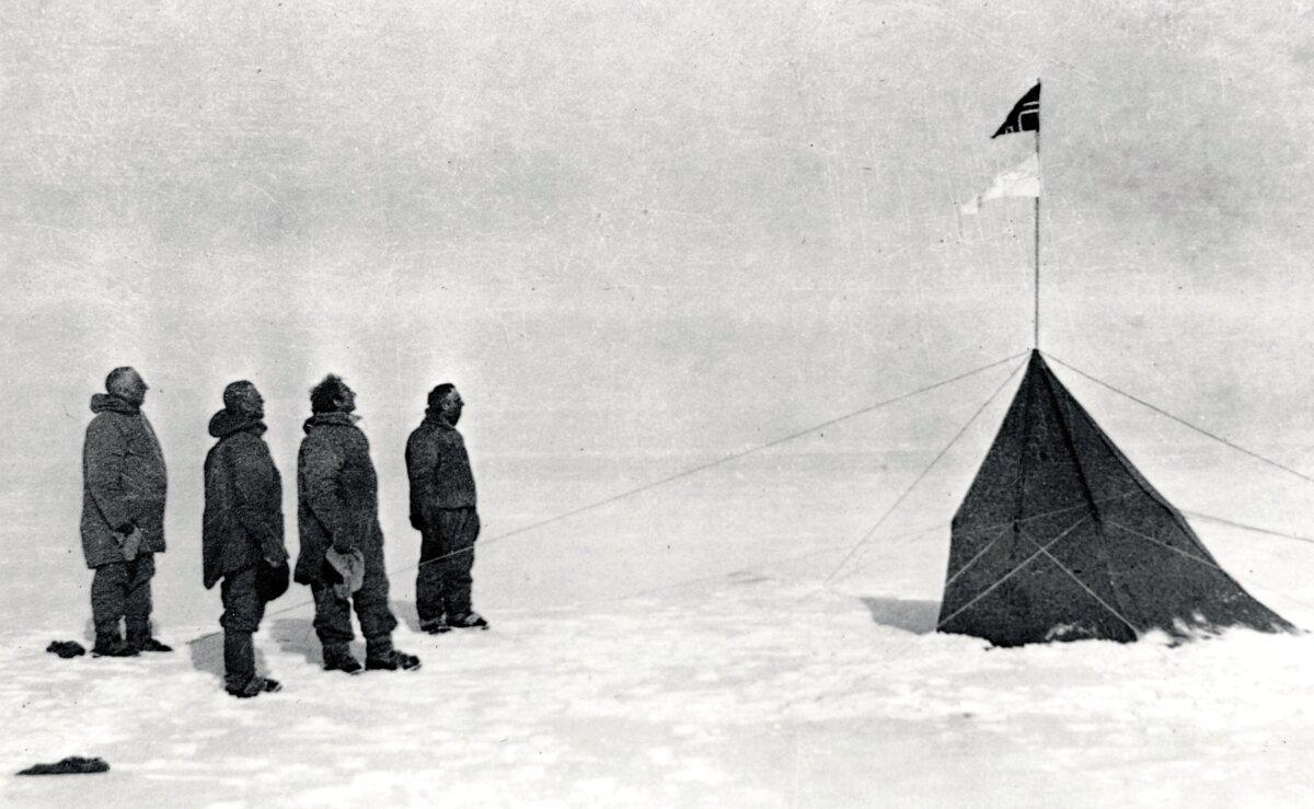 Roald Amundsen (L) and three members of his team after they planted the Norwegian flag at the South Pole in December 1911. (Public Domain)
