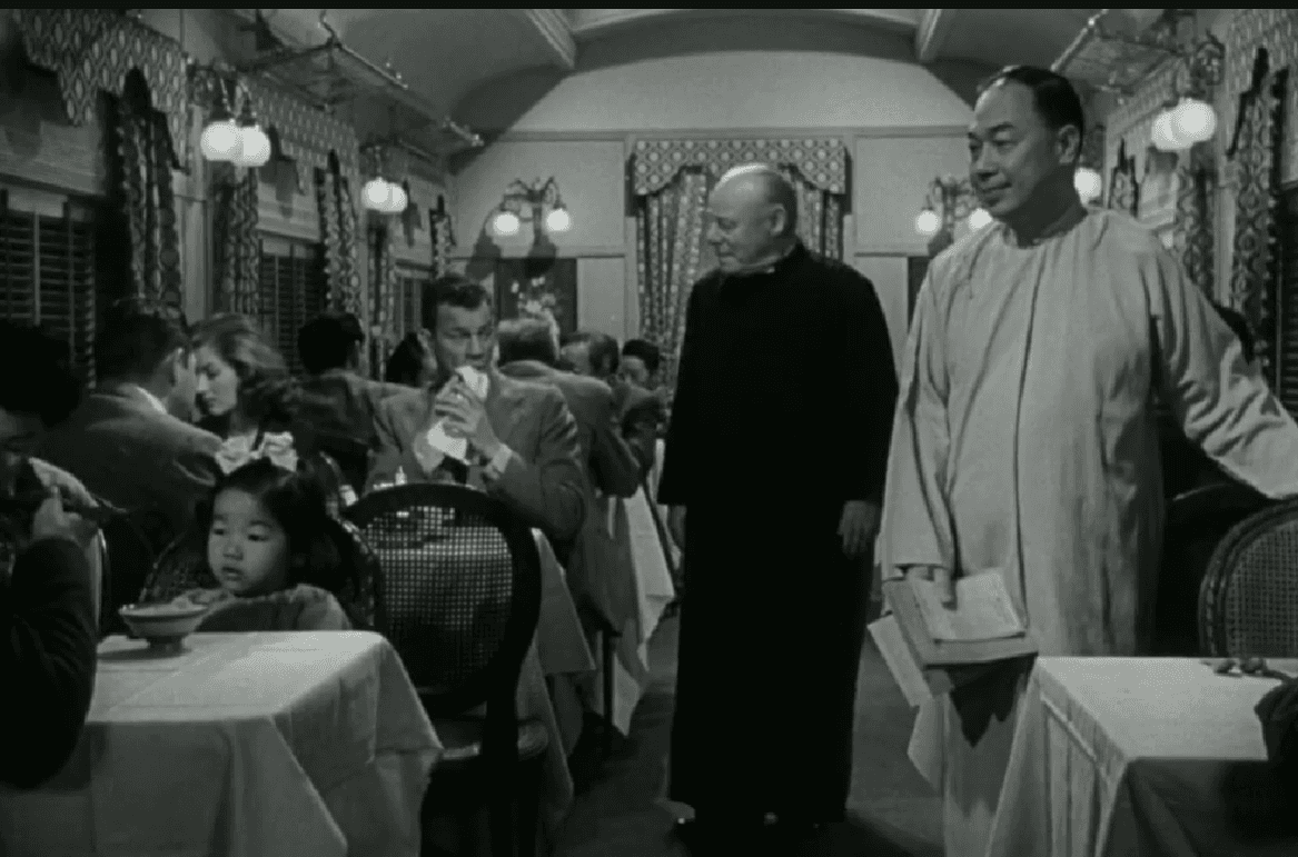 (L–R) Danielle Grenier (Corinne Calvet), Michael Bachlin (Joseph Cotten), and Fr. Joseph Murray (Edmund Gwenn), in “Peking Express.” (Paramount Pictures)