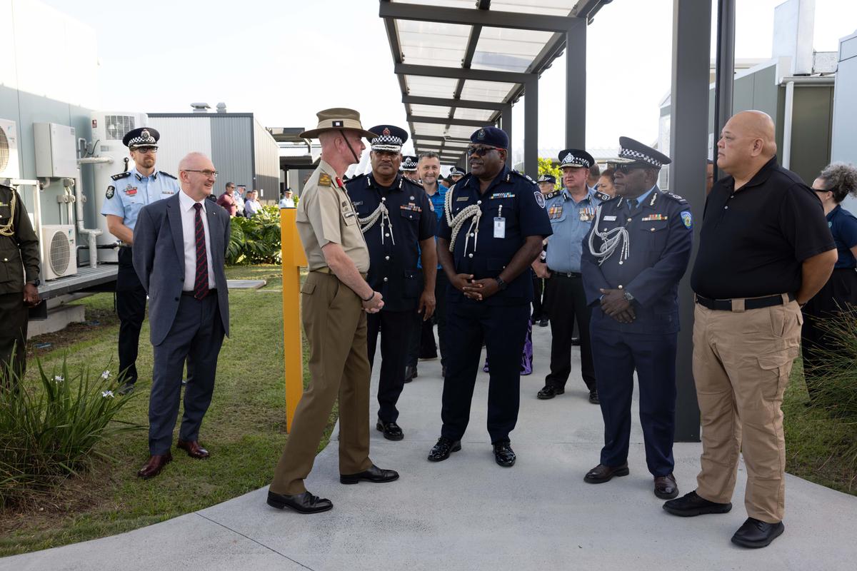 Police and military officials from Australia, New Zealand and the Pacific Islands at the first anniversary of the Pinkenba Hub in support of the Pacific Policing Initiative. (Courtesy of the Australian Federal Police)