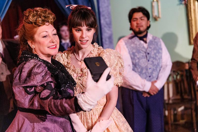 Lady Gabriella (Betsy Pennington-Taylor) shows Ruby Adams (Sophia Vitello) the beautiful jewels, while John Crook (Manny Sevilla) looks on, in "Sherlock Holmes and the Christmas Clowns." (Steven Townsend, Distant Era)