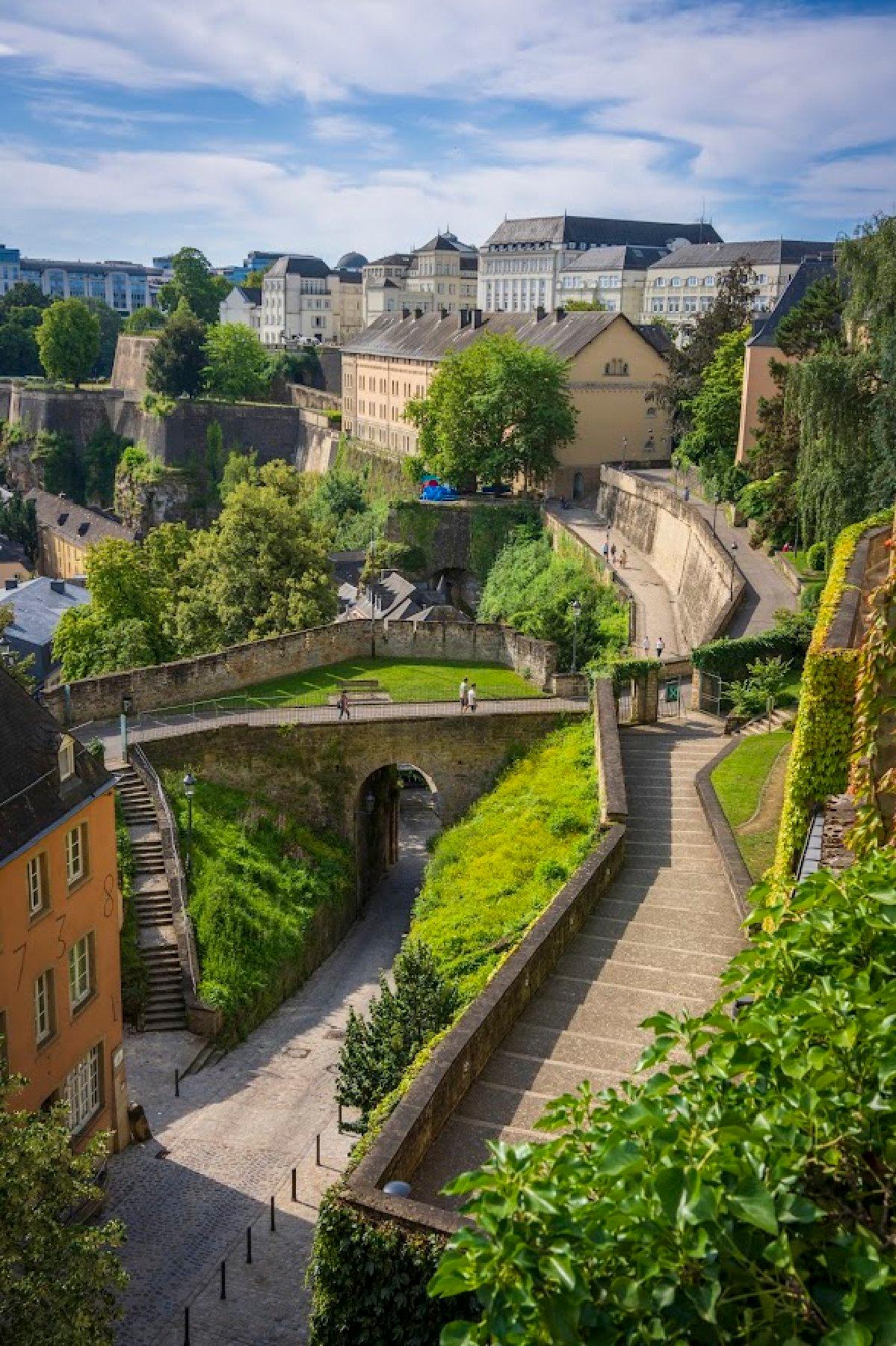 Promenades meander above the cliff face stone walls of Luxembourg City's Casemates du Bock that house a vast 10-mile network of impenetrable fortification tunnels and bastion galleries carved into the rock. (Photo courtesy of Luxembourg City Tourist Office)