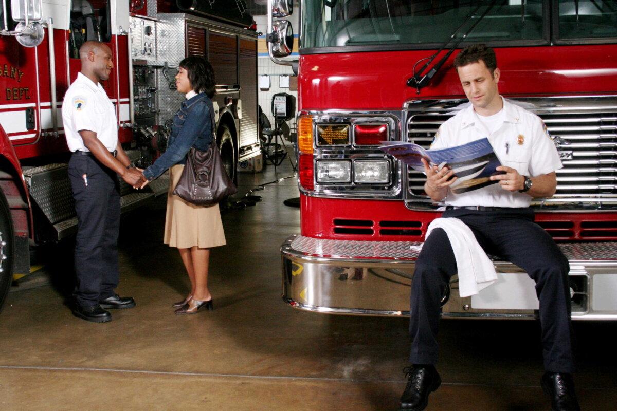 (L–R) Michael Simmons (Ken Bevel), Mrs. Simmons (Carla Hawkins), and Caleb Holt (Kirk Cameron), in “Fireproof.” (Samuel Goldwyn Films/MovieStillsDB)