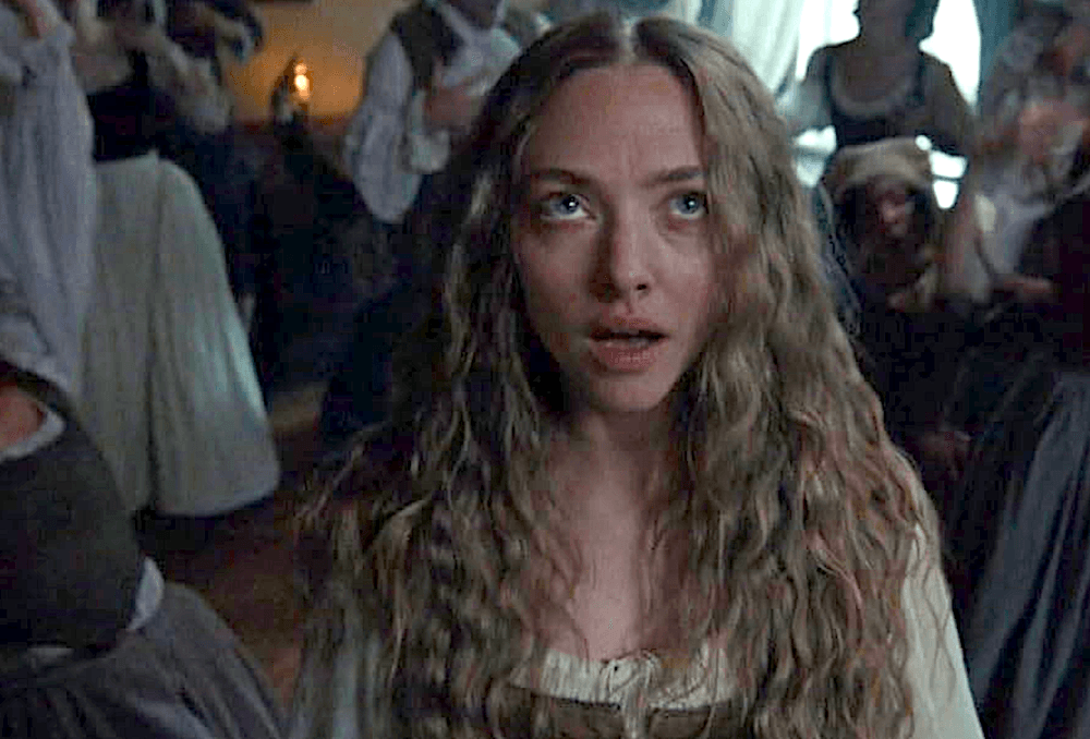 Ann Lee (Amanda Seyfried) feeling the spirit coming on, in "The Testament of Ann Lee." (Annapurna Pictures)