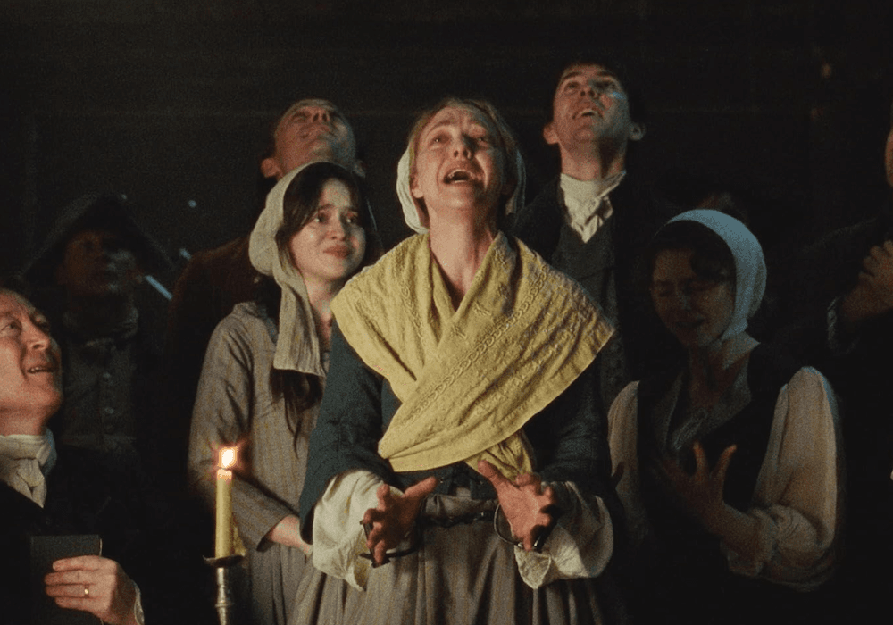 Mother Ann Lee (Amanda Seyfried, center) preaching, in "The Testament of Ann Lee." (Annapurna Pictures)