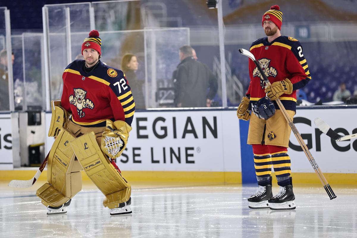 Sergei Bobrovsky (72) and Jeff Petry (2) of the Florida Panthers practice prior to the 2026 Discover NHL Winter Classic against the New York Rangers at LoanDepot park in Miami, Fla., on Jan. 1, 2026 . (Carmen Mandato/Getty Images)
