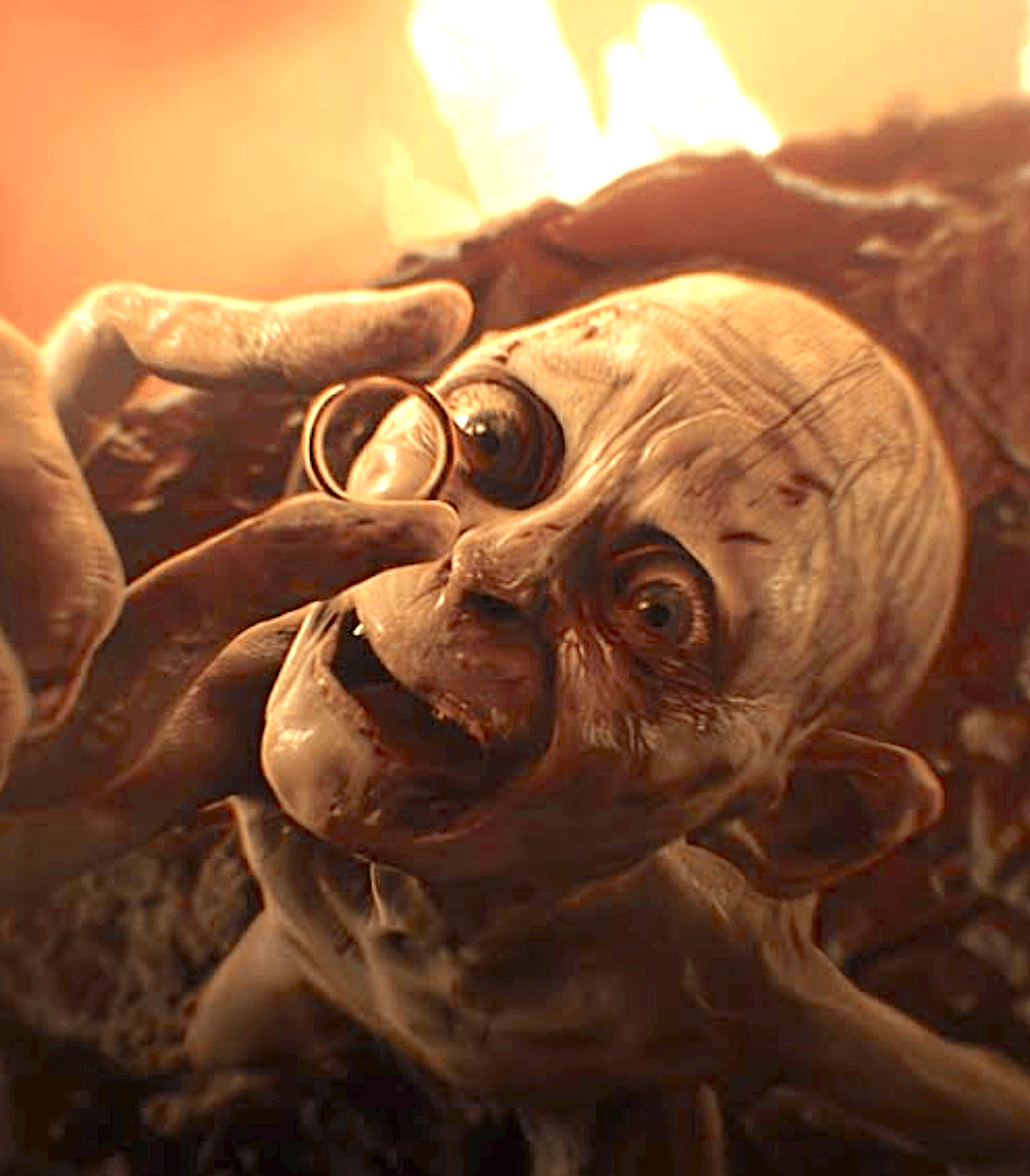 The piteous ring-junkie Gollum, formerly Smeagol (Andy Serkis), is finally reunited with "his Precious," the One Ring that poisoned his mind forever, in "The Lord of the Rings: The Return of the King." (New Line Cinema)