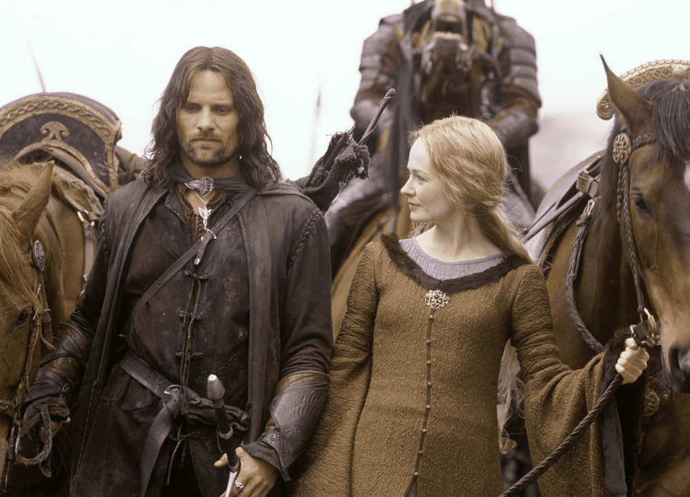 Aragorn (Viggo Mortensen) walks and talks with Eowyn, niece of Théoden (Miranda Ott0) in "The Lord of the Rings: The Two Towers." (New Line Cinema)