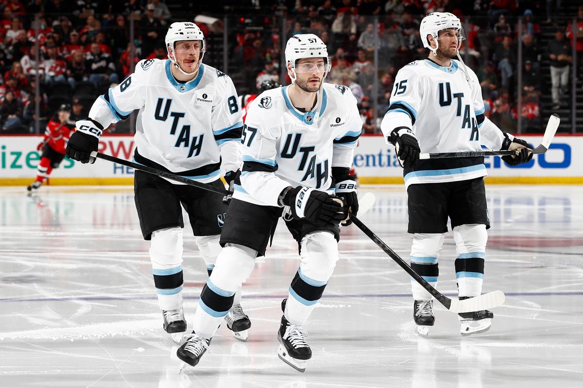 Nick DeSimone (57), Nate Schmidt (88), and Alexander Kerfoot (15) of the Utah Mammoth in action against the New Jersey Devils at Prudential Center in Newark, N.J. on Jan. 3, 2026. (Sarah Stier/Getty Images)