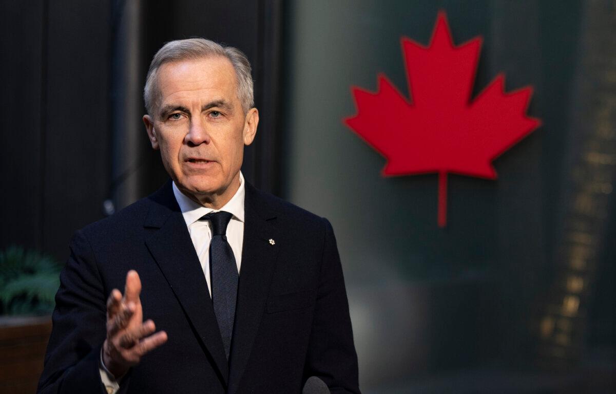 Prime Minister Mark Carney speaks to the media at the Canadian Embassy in Paris, France on Tuesday, Jan. 6, 2026. (The Canadian Press/Christinne Muschi)
