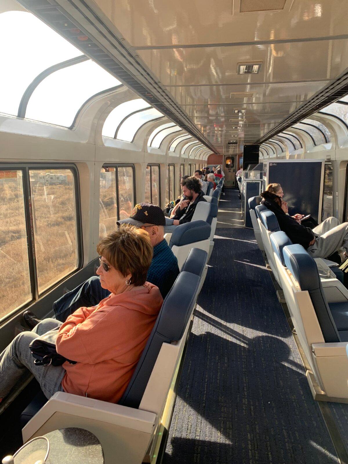 Amtrak passengers enjoy the views from the observation car during their 43-hour journey from Los Angeles to Chicago. (Sharon Whitley Larsen)