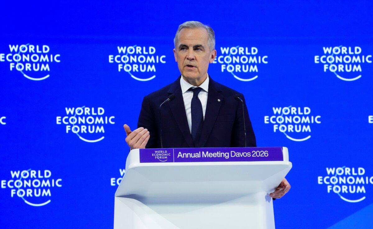 Prime Minister Mark Carney delivers a speech at the World Economic Forum in Davos, Switzerland, on Jan. 20, 2026. (The Canadian Press/Sean Kilpatrick