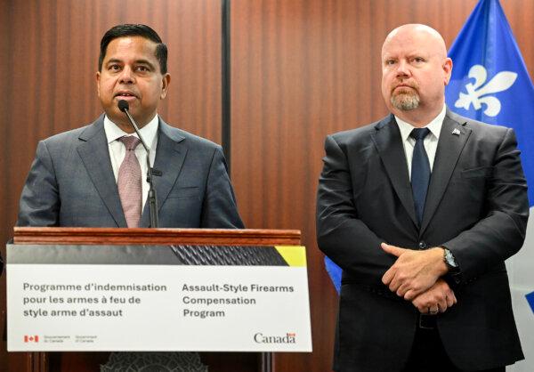 Minister of Public Safety Gary Anandasangaree, left, speaks during a press conference on the Assault-Style Firearms Compensation Program in Montreal, Jan. 17, 2026, as Quebec Minister of Public Security Ian Lafreniere looks on. (The Canadian Press/Graham Hughes)