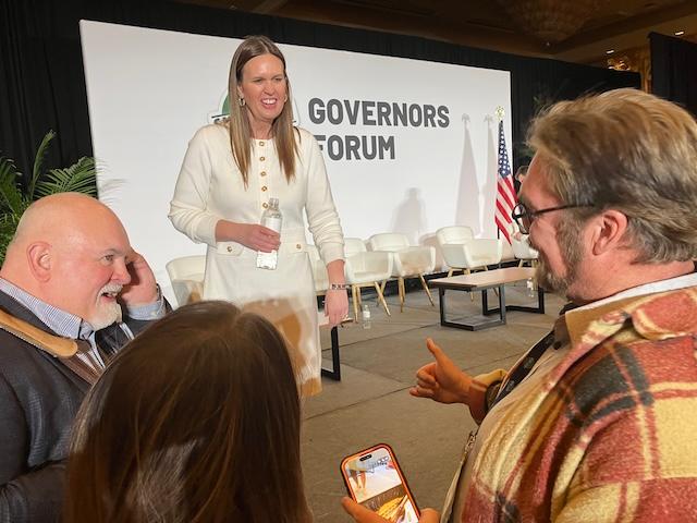 Arkansas Gov. Sarah Huckabee Sanders speaks with firearms industry representatives on Jan. 21, 2026, after participating in a Governors’ Forum at the Shooting, Hunting, and Outdoor Trade Show in Las Vegas, where 60,000 people are expected to view and purchase outdoor and law enforcement gear from more than 2,800 companies during the three-day annual trade show. (John Haughey/Epoch Times)