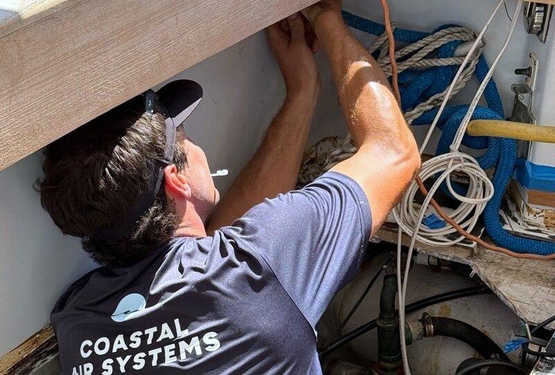 Lauren Chervinski's husband Jeremy Arnal works on a yacht repair in West Palm Beach, Florida. (Photo courtesy Lauren Chervinski)