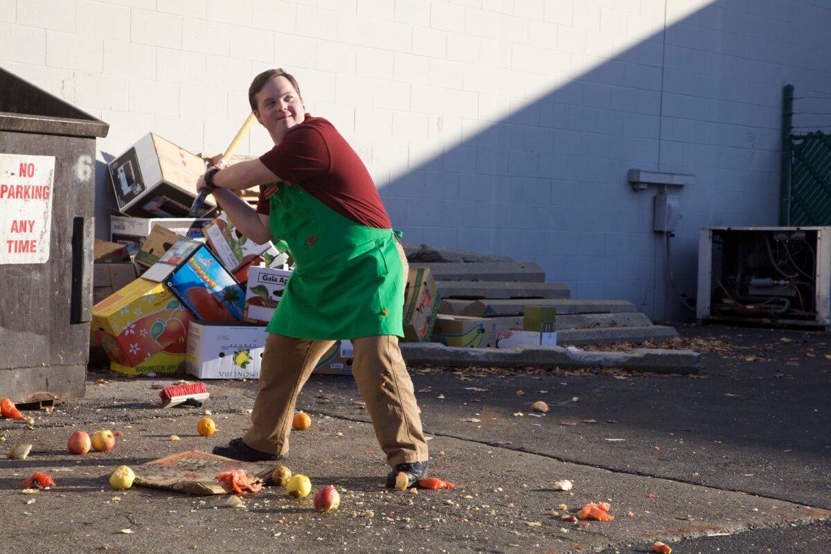 Produce (David DeSanctis) takes a swing, in “Where Hope Grows.” (Roadside Attractions)