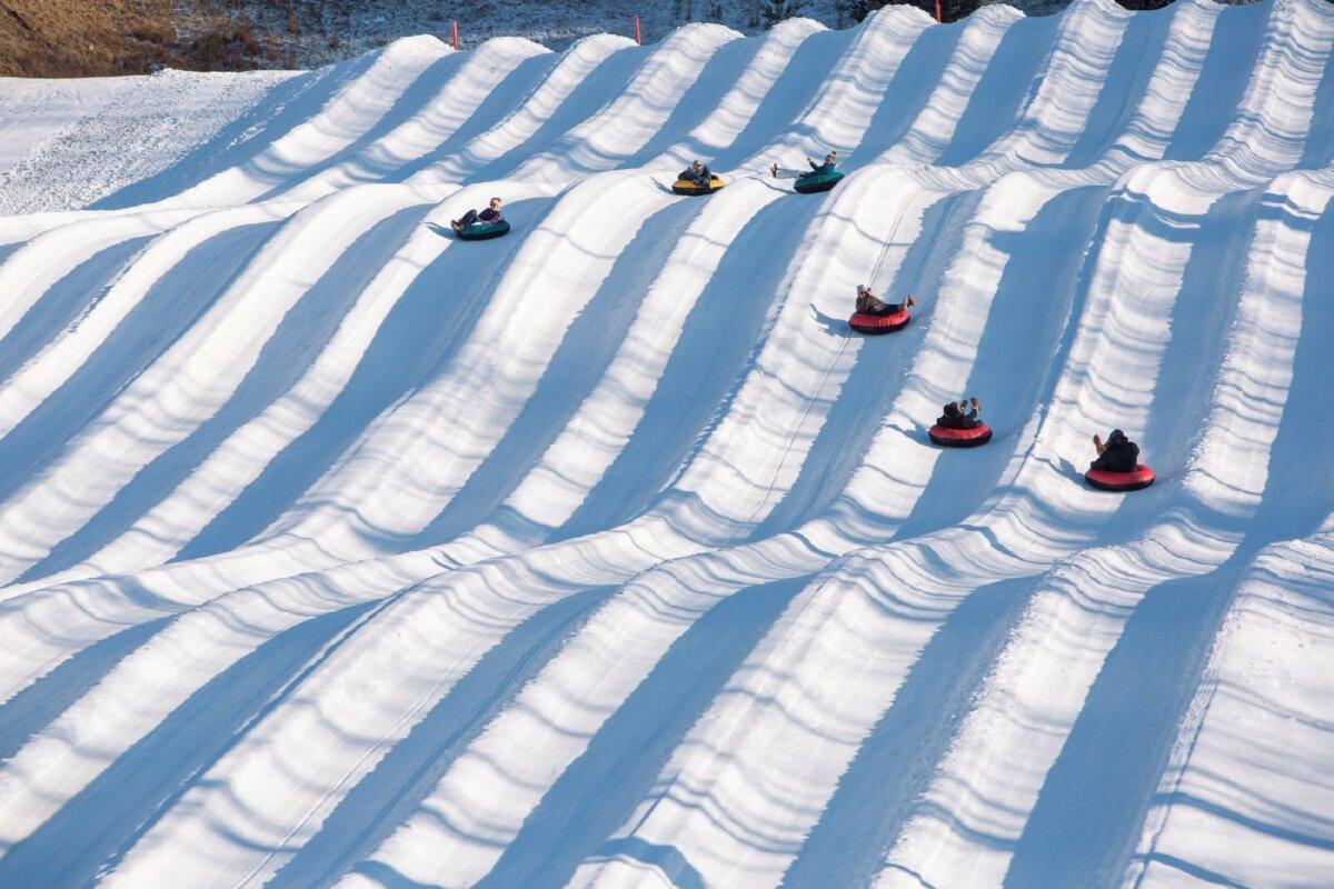 Snow-tubers sail down 900-foot-long runs at Massanutten Resort's Family Adventure Park in Virginia. (Photo courtesy of Massanutten Resort)